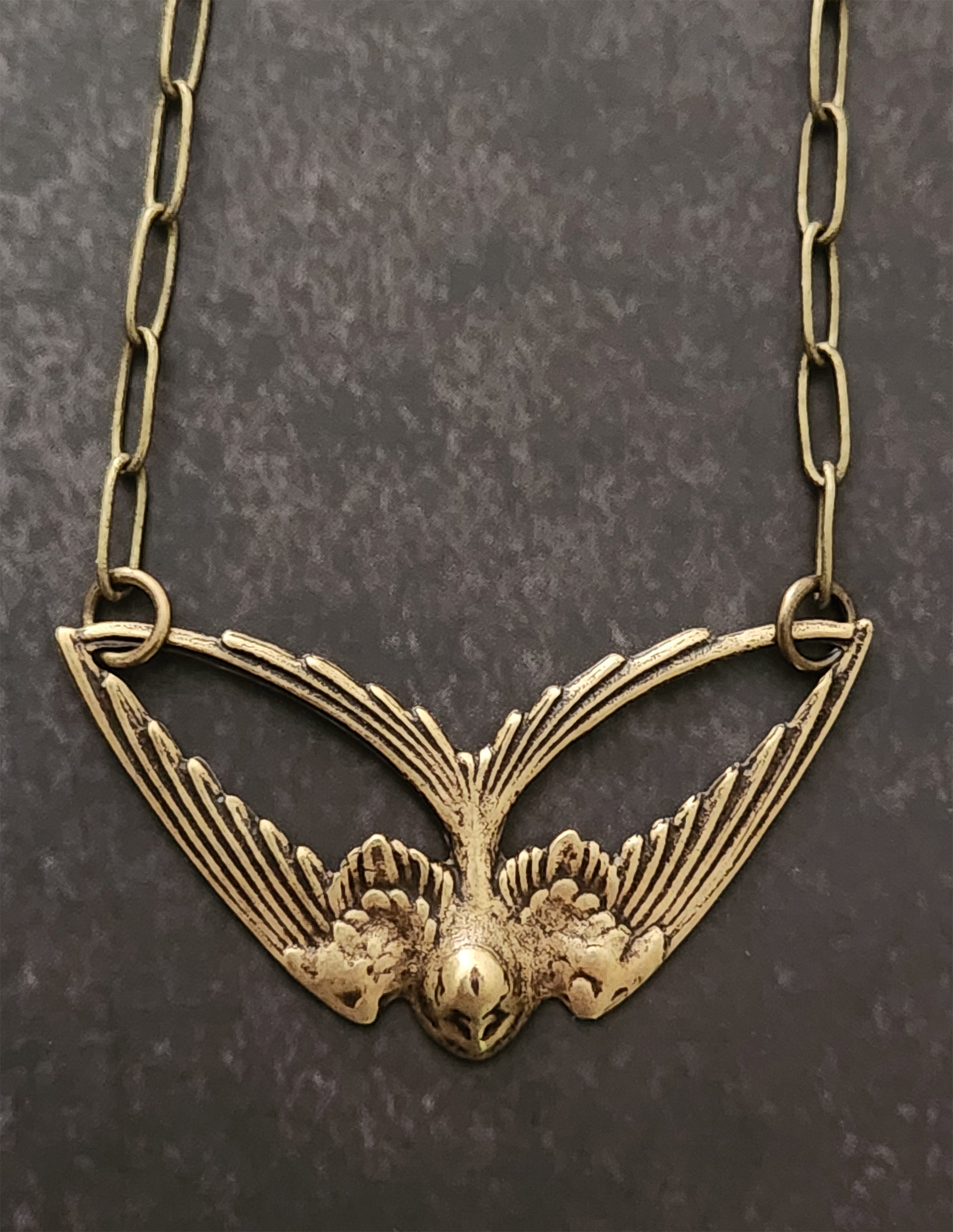 geo swallow necklace